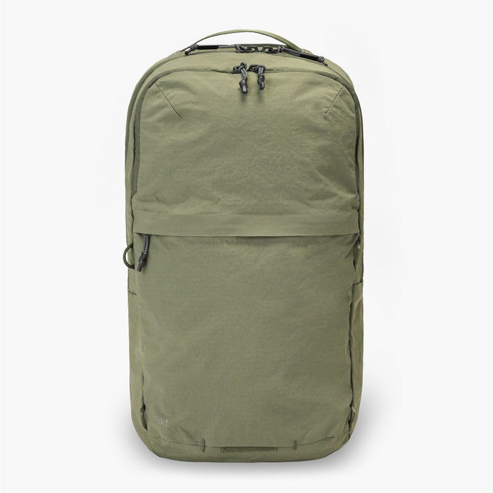 Green backpack on a white background