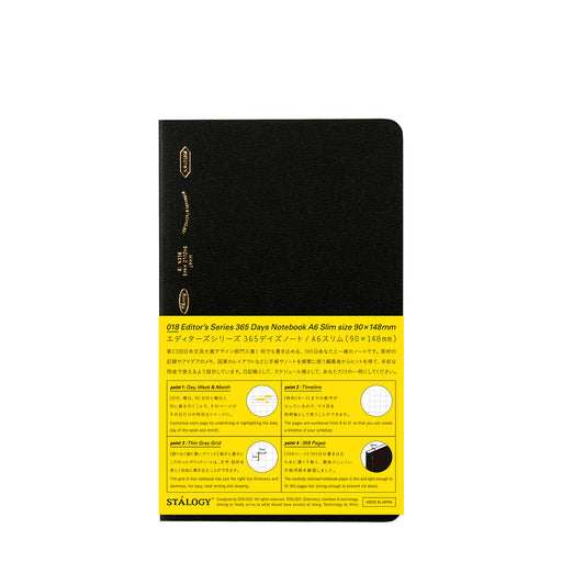 Black notebook with yellow label on a white background